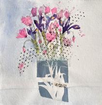 Spring flowers in a blue and white jug with collaged tissue paper.
