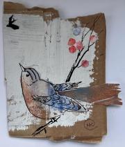 Little bird looking up wards to another bird flying overhead