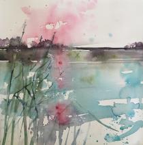 Calm image of a fen in pink and green with reeds in the foreground