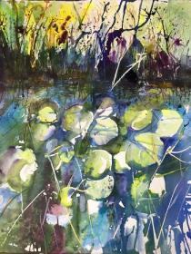 Yellow green bank with reeds above waterlilies
