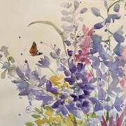 Delphiniums with a butterfly