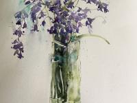 Bluebell Bouquet. Bluebells with forget me nots in a tall glass vase.