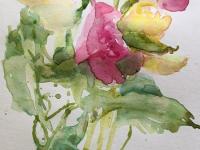 Pink and yellow roses in a small bouquet