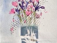 From Broken to Beautiful Spring flowers in a blue and white jug with collaged tissue paper.